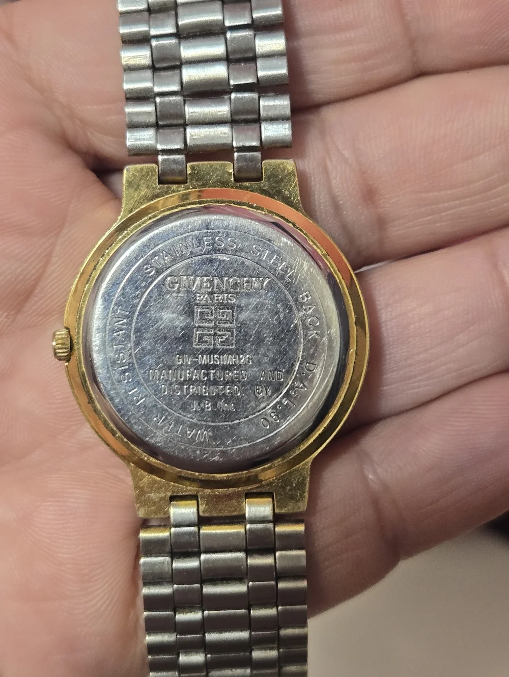 GUC Vintage Givenchy Gold Tone Black Dial Ladies Watch